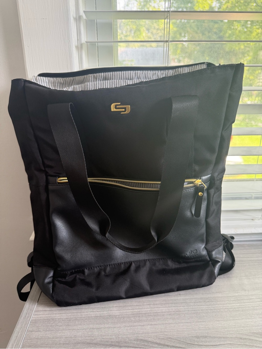 solo Black Tote-Style Backpack with Gold Hardware